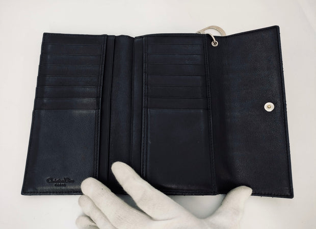 Lady Dior Black trifold long
wallet, silver hardware, patent leather