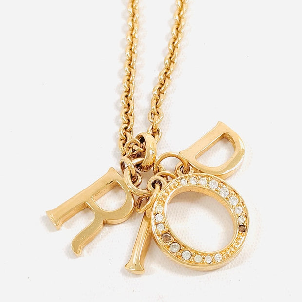 Christian Dior gold and charms logo charms necklace