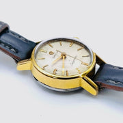 Vintage omega ladymatic automatic leather strap and white round dial watch