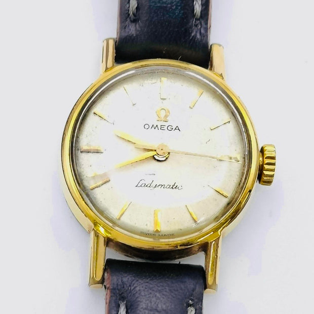 Vintage omega ladymatic automatic leather strap and white round dial watch