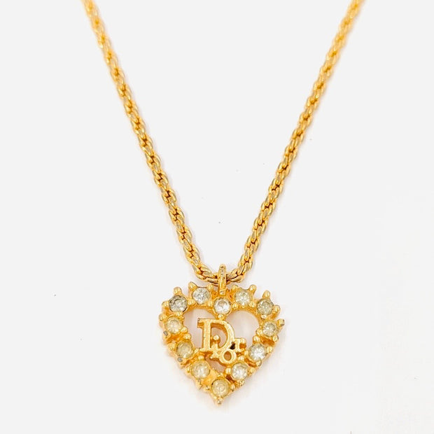 Christian Dior adjustable heart logo pendant necklace in gold and crystals