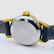 Vintage omega ladymatic automatic leather strap and white round dial watch