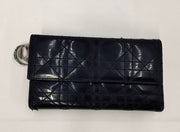 Lady Dior Black trifold long
wallet, silver hardware, patent leather