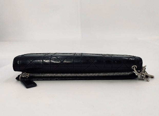 Lady Dior Black trifold long
wallet, silver hardware, patent leather